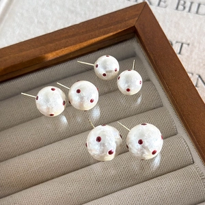 French style red polka dot cotton pearl stud earring set on beige velvet display