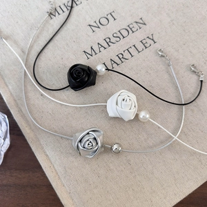 French chic rose pearl choker necklace set in black, white, and silver metallic finishes