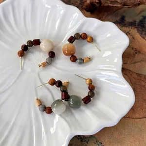 Retro sandalwood beaded C-shape hoop earrings with wood and resin geometric spheres