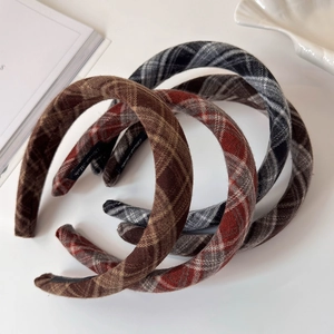 Three retro plaid headbands in brown, red, and grey for autumn and winter outfits
