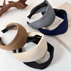 Set of wide knitted headbands in five colors with non-slip inner teeth design