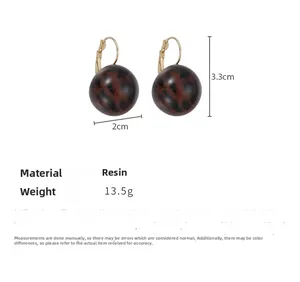 Detail showing dimensions of leopard print resin ball earrings with gold-toned hooks