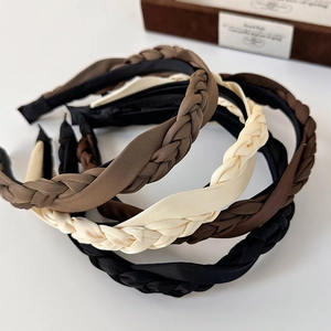 French vintage satin braided headband in neutral colors like brown, beige, and black