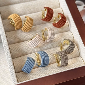 Five pairs of fabric-wrapped C-shaped hoop earrings in vintage autumn colors for women