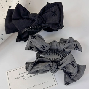 Pinces à cheveux nœud papillon noir et gris pour queues de cheval et chignons