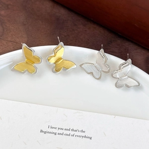 3D textured brushed metal butterfly stud earrings in gold and silver finish