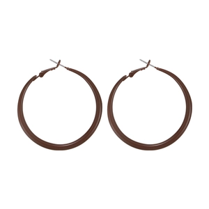 Close-up of matte brown geometric hoop earrings with silver pins on a white background