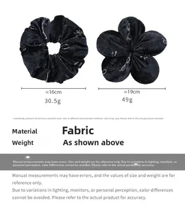 Detailed comparison of black velvet hair scrunchies with white dots and bows in two sizes