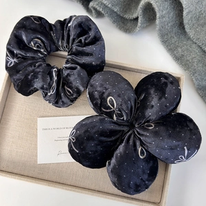 Elegant black velvet scrunchie and flower hair tie set with white polka dot patterns