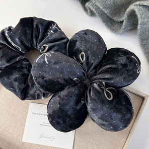 Polka dot velvet bow scrunchie and floral hair clip set for elegant winter hairstyles