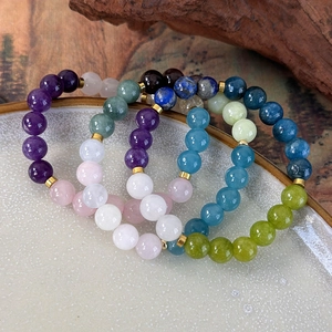 Handmade bohemian beaded bracelets with natural semi-precious stones and gold spacers
