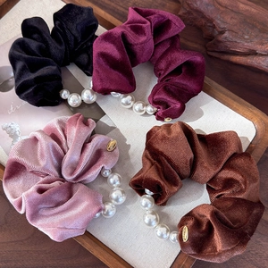 Elegant velvet scrunchies set with white pearls in black, burgundy, pink and brown