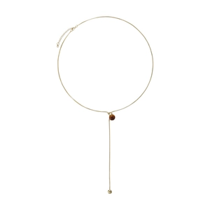 Minimalist golden Y-shaped collar necklace with brown tiger eye bead and long tassel chain