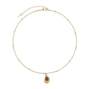 Golden tiger eye stone pendant necklace with dainty bead chain on a clean white background