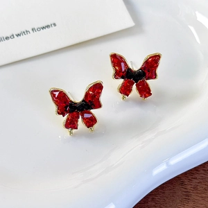 Vintage butterfly stud earrings with red and black crystals in gold-plated settings