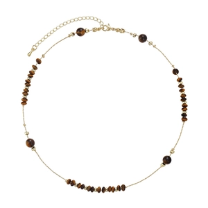 Detail of bohemian tiger eye beaded necklace with adjustable lobster clasp and gold spacers