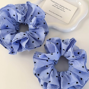 Blue striped scrunchies with black heart patterns in a four-layer pleated design