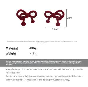 Detailed size chart of vintage red velvet bow earrings showing 2.5cm width and alloy material
