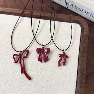 Vintage Red Bow Pendant Necklace For Women Alloy Lacquer Finish Black Wax Rope Sweater Chain Autumn Winter Accessories