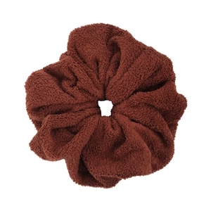 Soft red-brown towel fabric scrunchie with fluffy texture for gentle hair styling