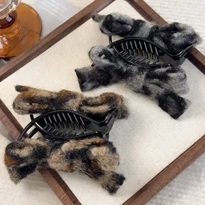 Plush faux fur leopard print bow hair claws in retro brown and grey textures