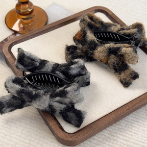 Faux fur leopard print bow hair claw clips for autumn and winter buns and ponytails