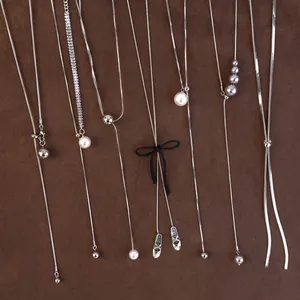 Adjustable silver long necklaces with assorted pearl and bow pendants for women