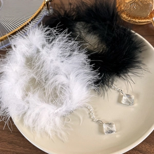 Vintage style feather choker with crystal tassels in black and white colors