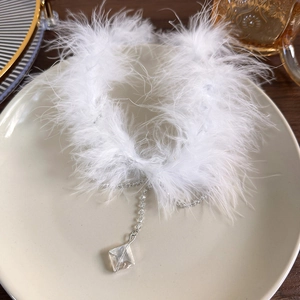 White feather choker necklace with clear crystal fringe and geometric pendant