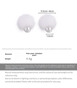 Detail showing white faux fur ball and pearl earring dimensions of 3.5cm-4cm overall