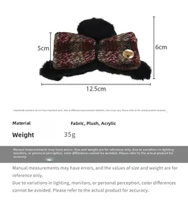 Detail view of plush bow hair claw with dimensions 12.5cm long and 6cm total height