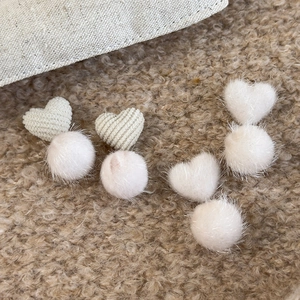 Winter heart-shaped corduroy and faux fur ball earrings in warm white plush texture