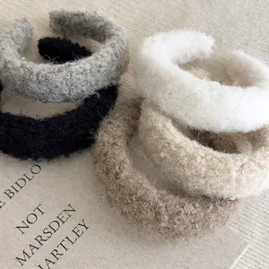 Winter faux lamb wool headbands in grey black white and beige colors for stylish women
