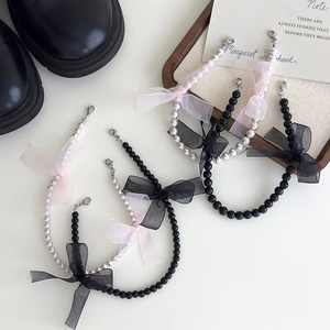 Bijoux de chaussure avec nœud en dentelle et perles avec fermoir mousqueton en métal