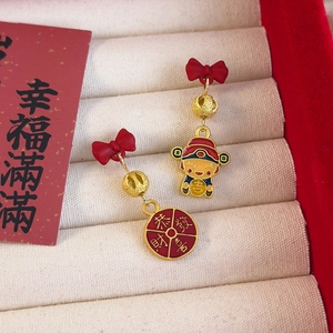 Festliche chinesische Neujahrs-Ohrringe mit roten Schleifen und goldenen Anhängern