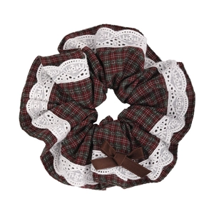 British style plaid hair scrunchie with lace trim and brown bow on white background