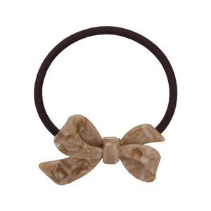 Elegant marble-patterned acetate bow hair tie with dark brown elastic for ponytails