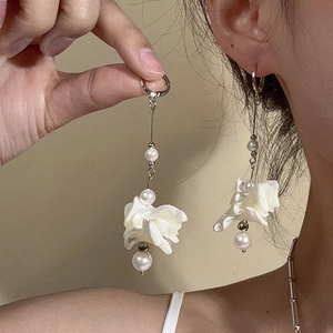 Elegant long shell petal pearl dangle earrings with silver metal finish for women