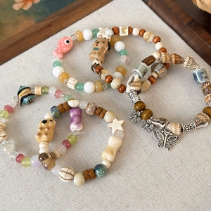 Braccialetti di perline in ceramica fatti a mano con ciondoli animali stile boho