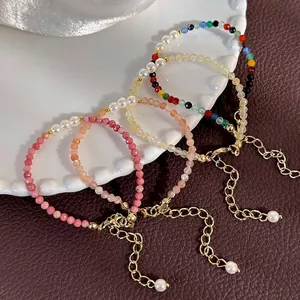 Colorful crystal and pearl beaded bracelets with gold finish extension chains