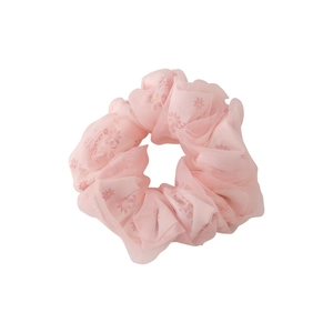 Chouchou en tulle rose à fleurs avec motifs marguerites pour queue de cheval chic