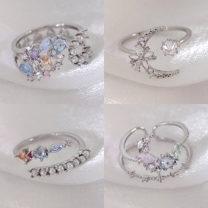 Adjustable silver rings set with pearls, floral motifs and colorful zircons for women