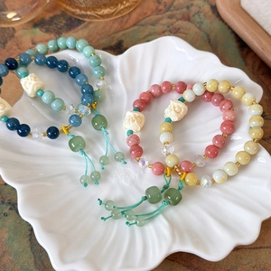 New Chinese style beaded bracelets with lion dance head charms and silk tassels