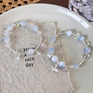 Beaded bracelets with colorful crystal glass beads featuring fishtail and shell charms