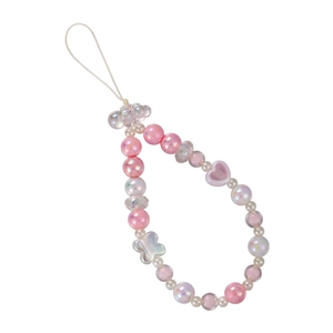 Pink beaded phone charm with bow and heart accents, featuring pearl luster finish