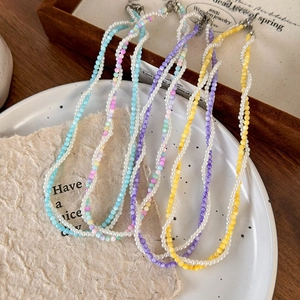 Colorful beaded choker set with imitation pearls and vibrant dopamine style twisted chains