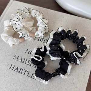 Three-piece set of ruffle polka dot scrunchies with decorative oval beads