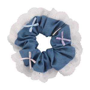 Blue denim and white lace scrunchie with colorful bows for ponytail styling