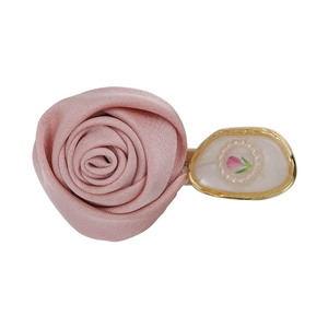 Pink satin rose hair clip with golden tulip charm and pearl details in French vintage style