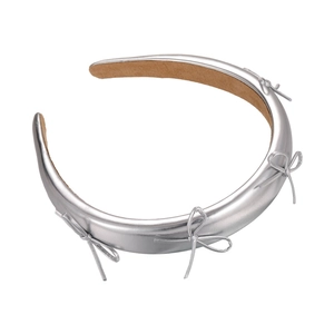 Silver bow wide leather headband with high top design and non-slip interior lining